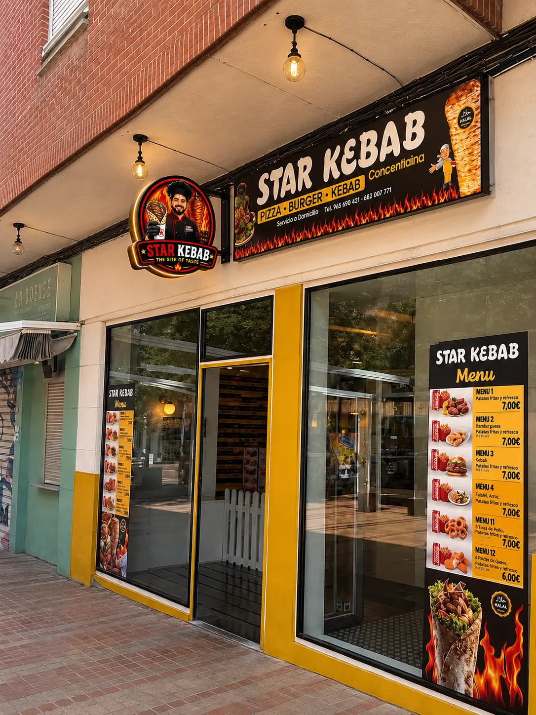 Fachada de Star Kebab en el Passeig del Comtat, letrero negro y amarillo y carta en el escaparate